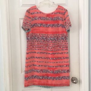 👗#17 Orange & print horizontal dress w/ pom-poms.